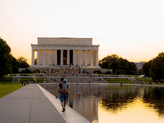 Family walking at Lincoln Memorial 