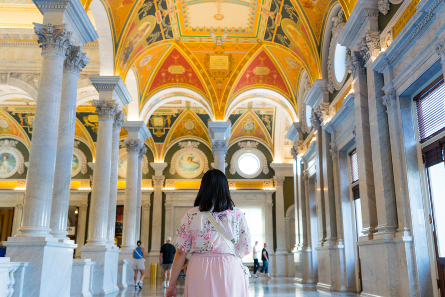 Person standing inside the Library Of Congress