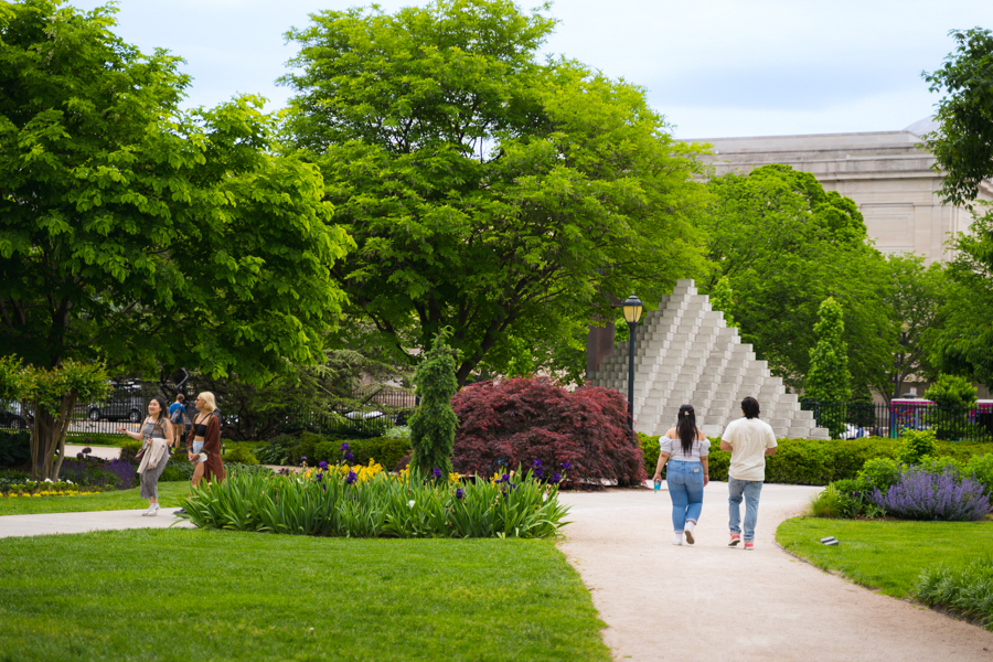 People Walking Through The National Gallery of Art Sculpture Garden