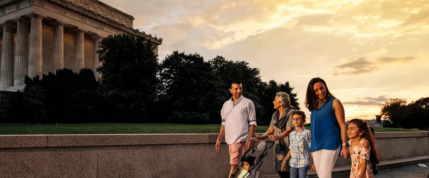 Family strolling by Lincoln Memorial