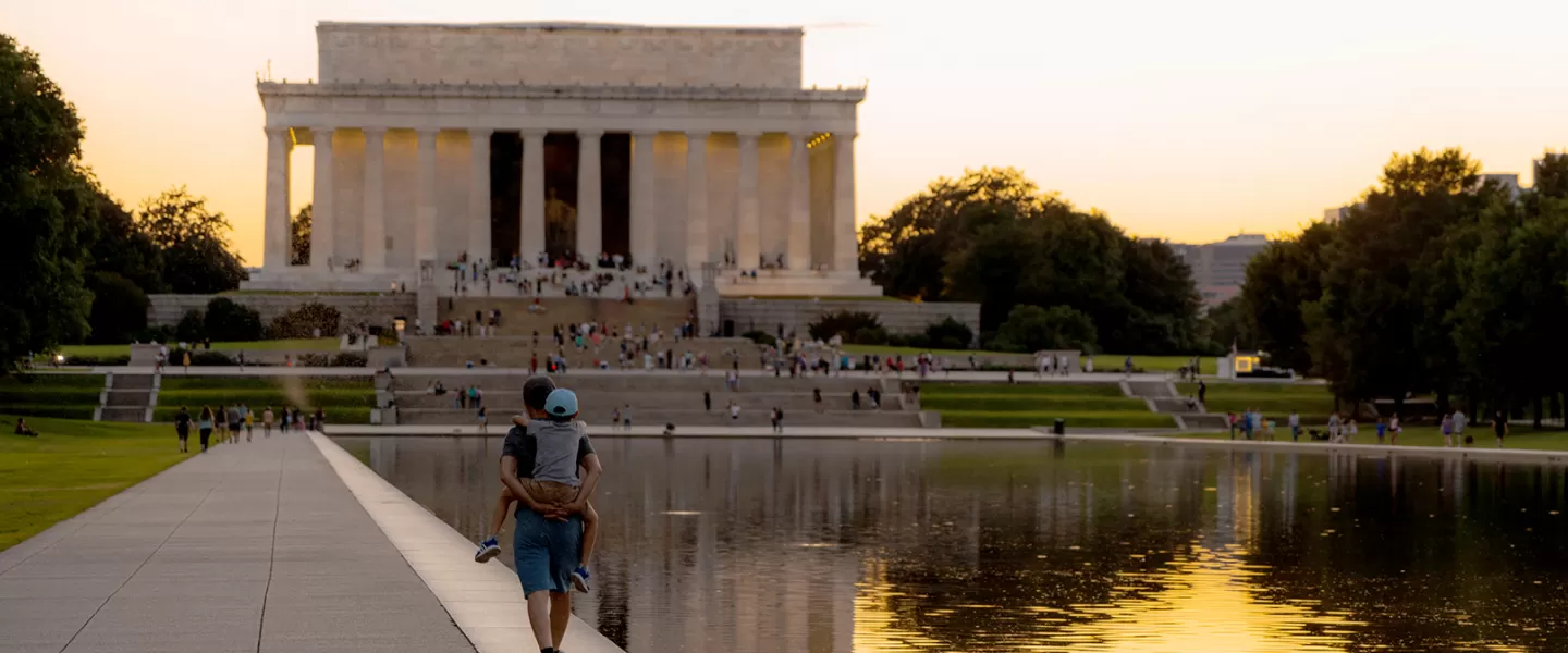 Family walking at Lincoln Memorial