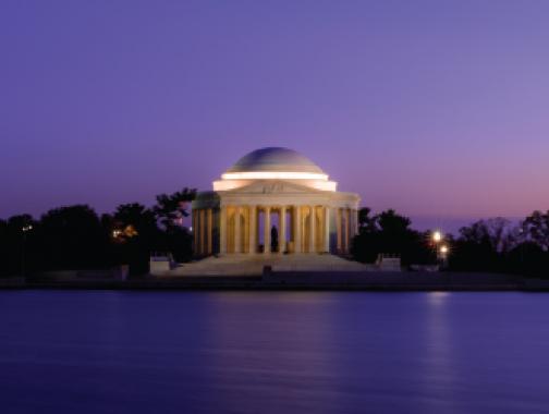 The Thomas Jefferson Memorial with a purple sky above and purple-tinted Potomac River below.